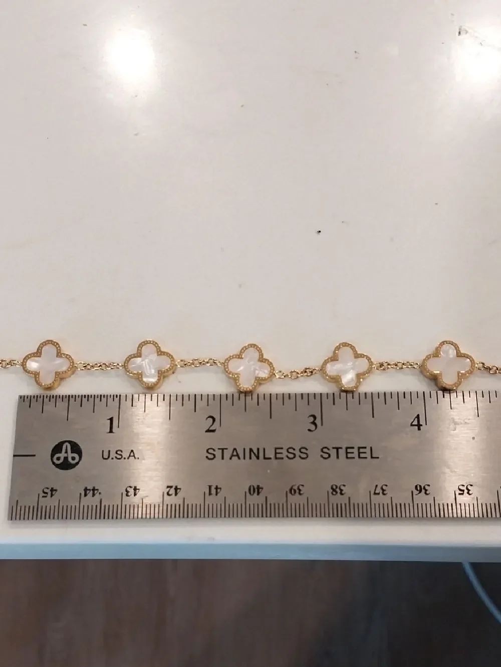 White Clover Bracelet On Stainless Steel Chain.